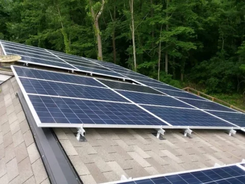 The home solar panels are installed at a 5/12 pitch angle.